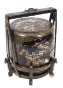 A Chinese black lacquer and gilt decorated sectional food container:, of drum shape,