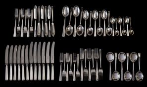 A George V silver flatware service, maker Cooper Bros, Sheffield, 1940: six table knives,