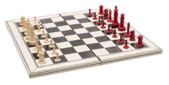 A 19th century Anglo-Indian ivory chess set : one side stained red , the other side left natural,