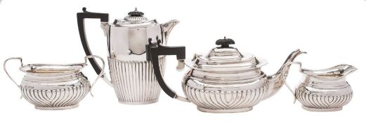 A matched George V silver three-piece tea service various makers and dates: inscribed,