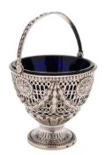 A George III silver swing-handled sugar basket, maker H.