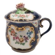 A First Period Worcester custard cup and cover: of bell shape with flower finial,