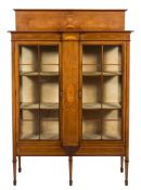 An Edwardian mahogany and inlaid display cabinet: crossbanded in satinwood,