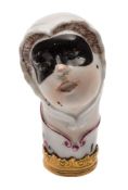 A Chelsea cane handle or etui cover: in the form of the head of Columbine with brown hair,
