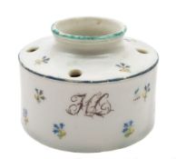 A Lowestoft inkpot: of drum form with four quill holders and everted rim,