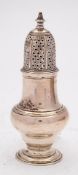 A George II silver pepper caster, maker John Delmester, London, 1758: crested,