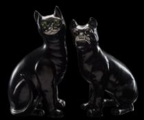 A Galle-style pottery cat and matching pug: each modelled in seated posture under black glazes and