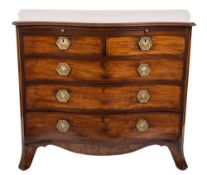 A George IV mahogany and inlaid serpentine-fronted chest:, the moulded top of serpentine outline,