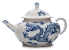 A Chinese blue and white miniature 'dragon' wine pot and cover: painted with two scaly dragons