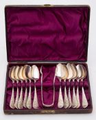 A set of twelve Victorian silver teaspoons and tongs, maker William Coghill, Glasgow,