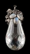 An Arts and Crafts silver and moonstone mounted quartz crystal, pear-shaped drop:,