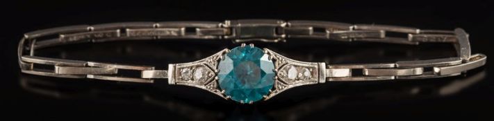 A blue zircon and diamond mounted expanding bracelet: the single,