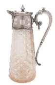 A clear cut glass and silver plate mounted claret jug: of tapering conical form,
