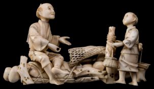 A Japanese carved ivory okimono,