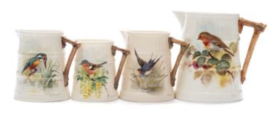 Four graduated Royal Worcester jugs painted by William Powell: of tapering barrel shaped form with
