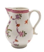 A Lowestoft sparrow beak jug: painted in 'Curtis' style with a ribbon tied bouquet within a floral