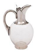 A George V silver mounted and clear glass claret jug, maker Goldsmiths & Silversmiths Company Ltd,