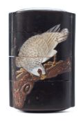 A Japanese four section lacquer inro: inlaid with mother of pearl decoration depicting a parakeet