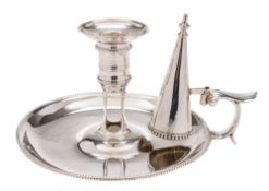 A George II silver chamberstick, maker William Cafe, London, 1758: crested,