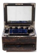 A Victorian coromandel and brass bound vanity box: of rectangular outline,