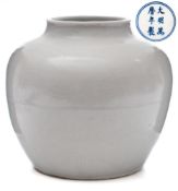 A Chinese porcelain jar with Anhua decoration: of oviform,
