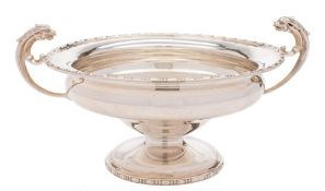 A George V silver pedestal comport, maker's mark worn, Chester 1919: with bobbin beaded border,