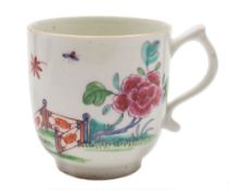 A Bow coffee cup: with scroll handle, painted in the famille rose palette with a large pink peony,