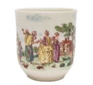 An early Worcester coffee cup: with grooved loop handle decorated with a coloured transfer print of