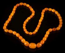 A graduated amber bead,