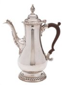 A George III silver coffee pot, maker Thomas Wallis I, London, 1770: of baluster form,