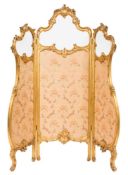 A French carved giltwood cartouche-shaped three fold screen:,