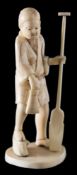A Japanese carved ivory okimono of a fisherman: holding a paddle, signed Ryushi, Meiji period, 11cm.