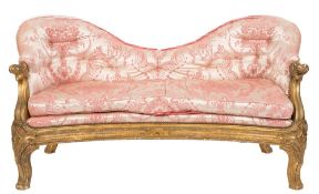 A Victorian carved giltwood settee:,