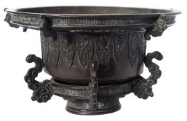A Chinese bronze vase: with spreading key pattern rim,