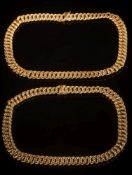 Two double curb-link necklaces:, each clasp stamped '750', 104gms gross weight.