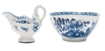 A Worcester blue and white 'dolphin ewer' creamboat and a Lowestoft bowl: the ewer with lamprey