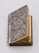 A Victorian silver novelty vinaigrette, maker Edward Smith, Birmingham, 1846: in the form of a book,