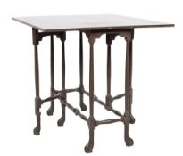 An 18th Century mahogany spider leg table:, with a rectangular hinged top on turned under framing,