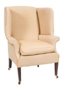 A mahogany wing frame armchair in the Georgian taste:,