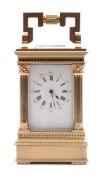 A miniature Anglaise carriage clock with fluted columns: the eight-day duration movement having a