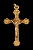 A gold crucifix pendant: with French control marks, approximately 44mm long, 4gms gross weight.