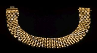 A two-colour bracelet: 12mm wide, the clasp stamped '750', 52gms gross weight.