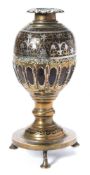 An Indian brass, silver and niello coconut vase: of ovoid form, with petal shaped flared rim,