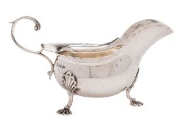 A Edward VII silver sauce boat, maker Walker and Hall, Sheffield, 1905: of traditional design,
