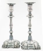 A pair of silver plated candlesticks, maker Elkington & Co,