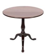 An 18th Century mahogany circular tea table:,