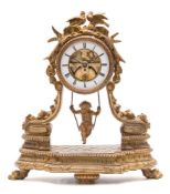 A French mantel clock with an unusual pendulum: the eight-day duration timepiece movement visible