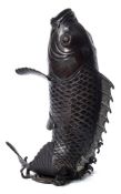 A Japanese bronze model of a leaping carp: with open mouth. and wide apart fins, unsigned, 29cm.