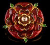 A red and green enamelled 'Tudor rose' brooch:, 27mm diameter, 13gms gross weight, in fitted case.