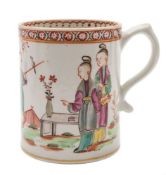 A Lowestoft mug: of cylindrical form tapering slightly towards the rim and with scroll handle,